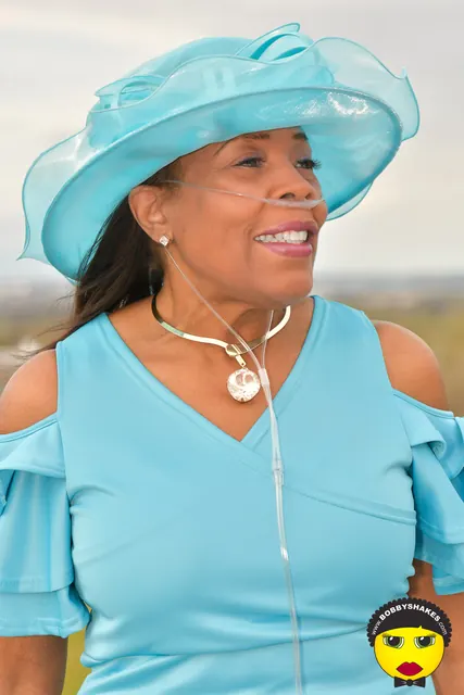 Guest in a sky-blue organza hat and ruffled blue dress at the 2026 Kentucky Derby Day Party in Boston
